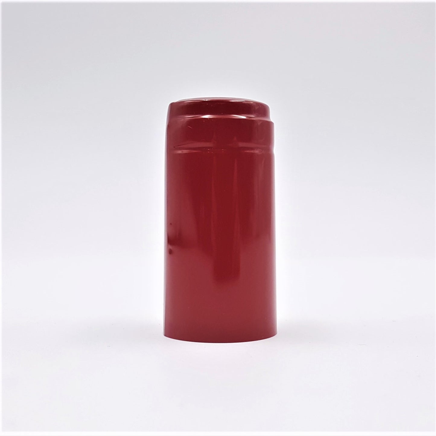 packet of 25 rich red gloss heat shrink capsules for wine bottles.