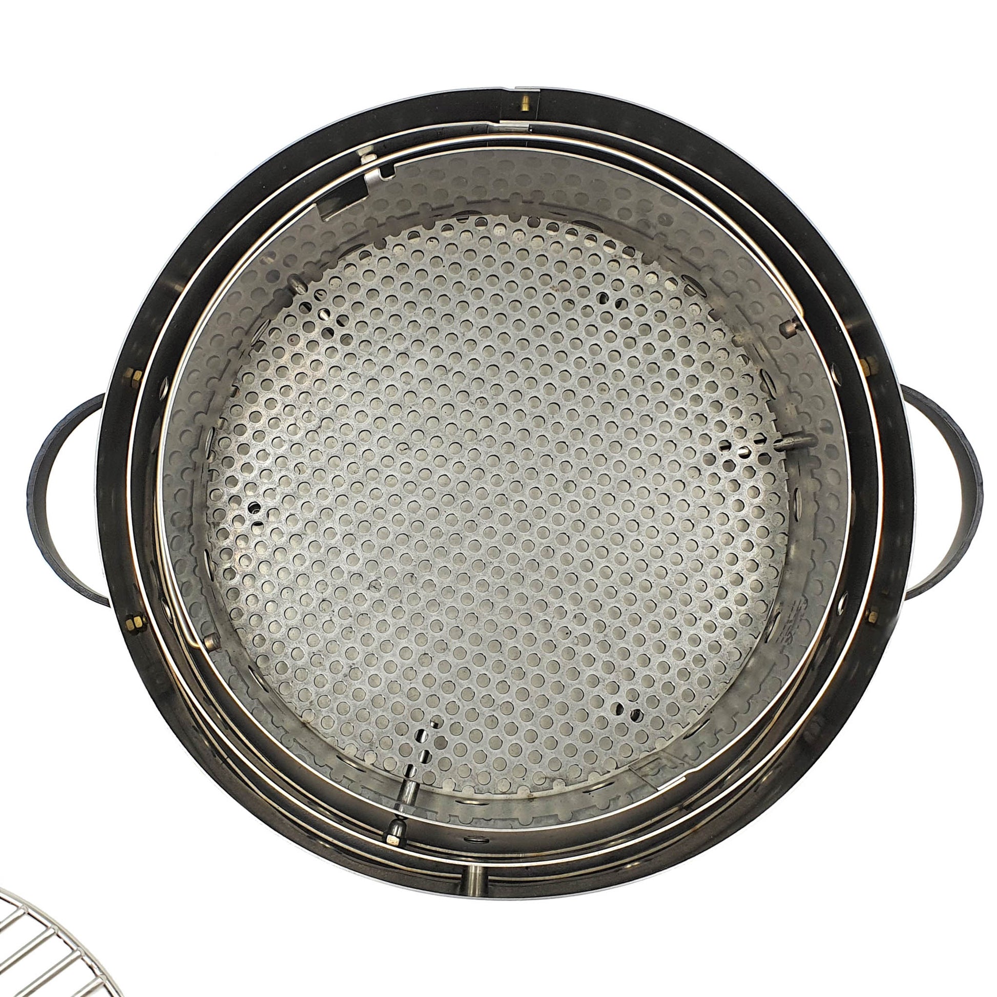 The table top bbq has a fire break and removable hearth.