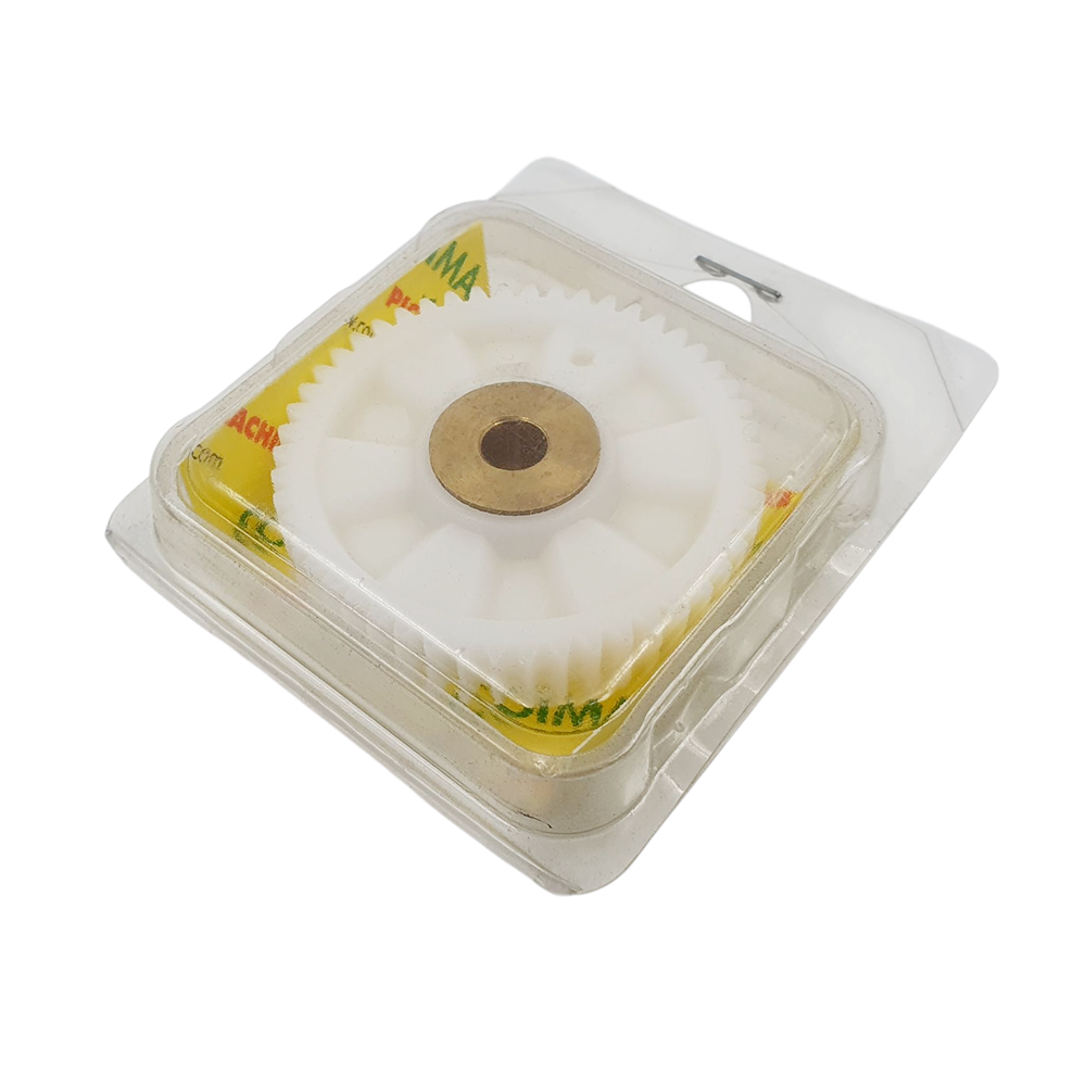 Square driving cog with circular component in clear packaging on a white background