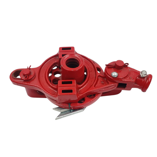 Red metal component on a white background