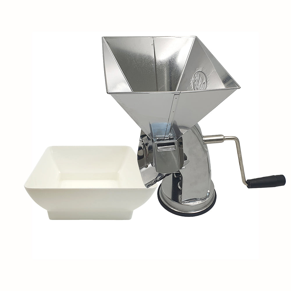 Manual juicer with a white container on a white background