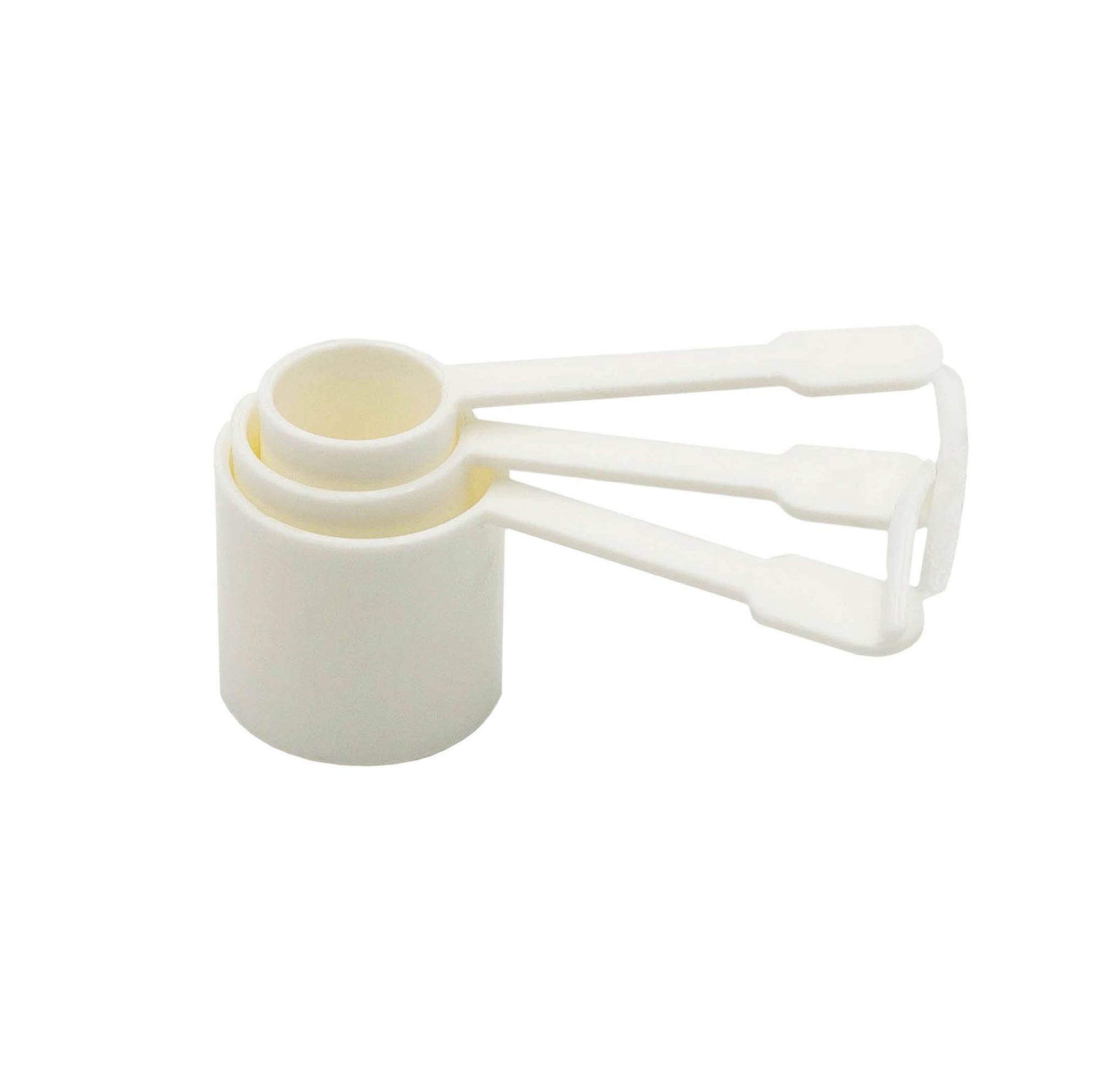 white plastic measuring cups for measuring sugar amounts for carbonation in 330ml, 500ml and 750ml bottles. 