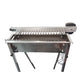 Charcoal skewer grill holds 20 skewers. Auto rotating motor plug in or battery power.